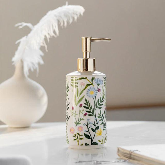 Soap dispenser made of ceramic with floral design