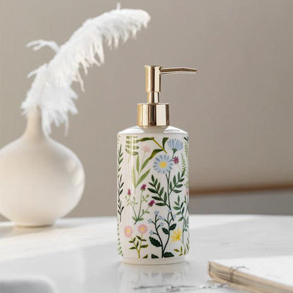 Soap dispenser made of ceramic with floral design